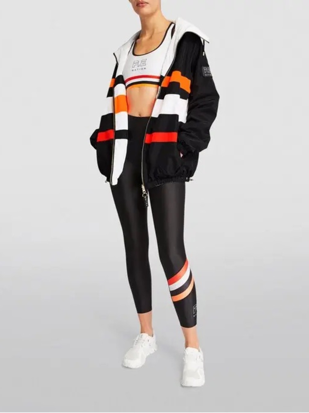 P.E Nation Women’s Legacy Run Jacket Black in Jacket with Gold Zipper Size Large